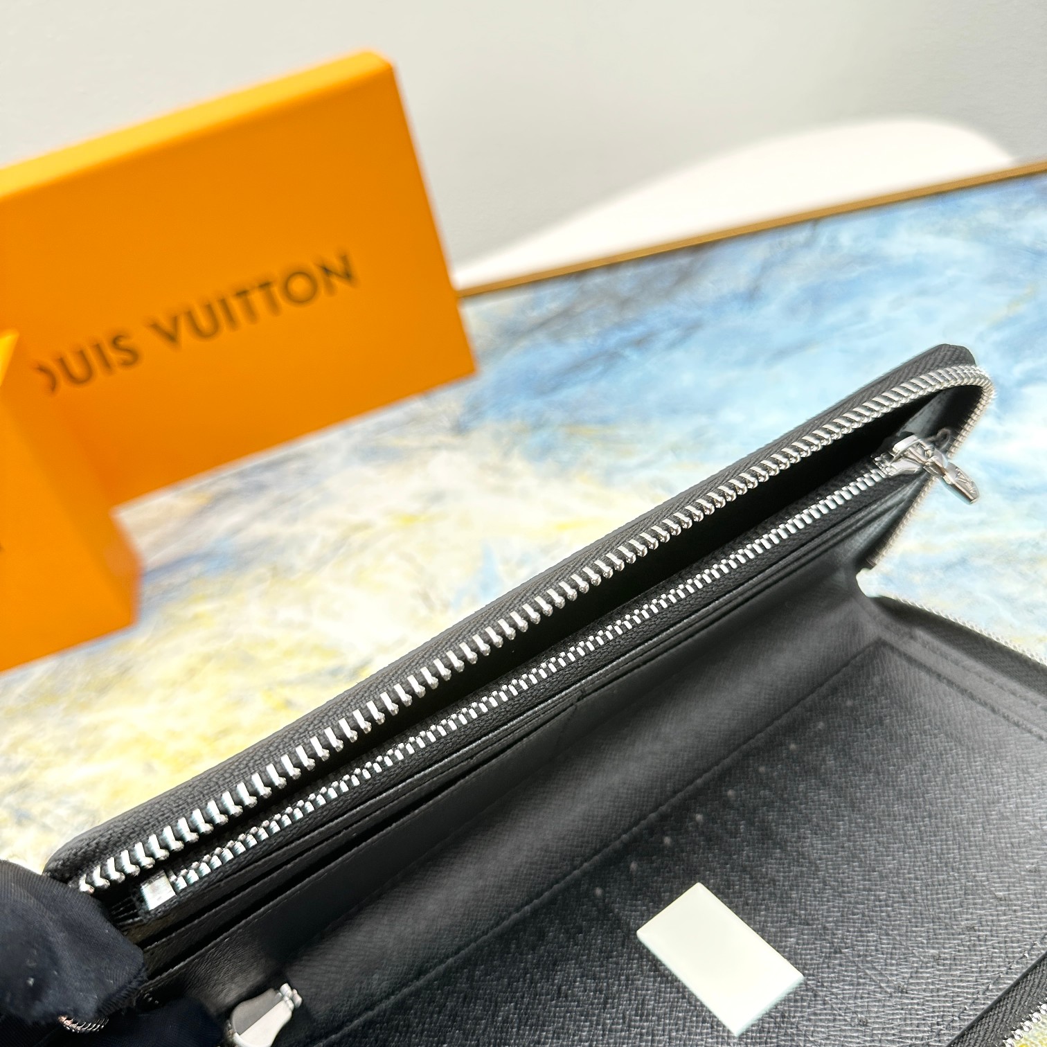 Lifestyle shot of leather wallet in use