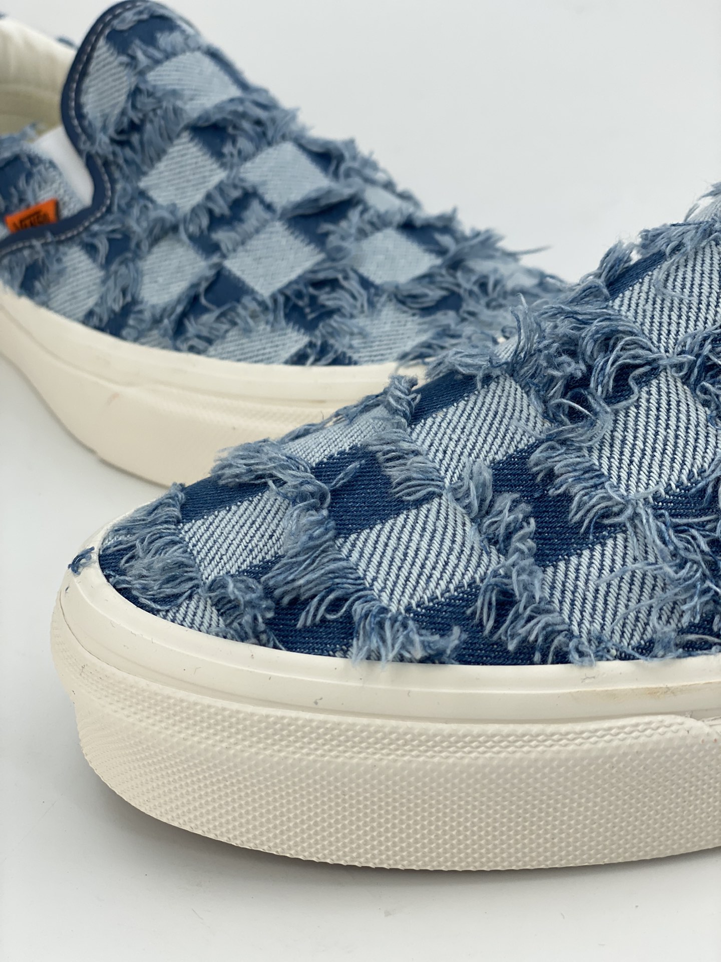 Vans European and American summer checkerboard fringed denim and silk men's and women's same style slip-ons