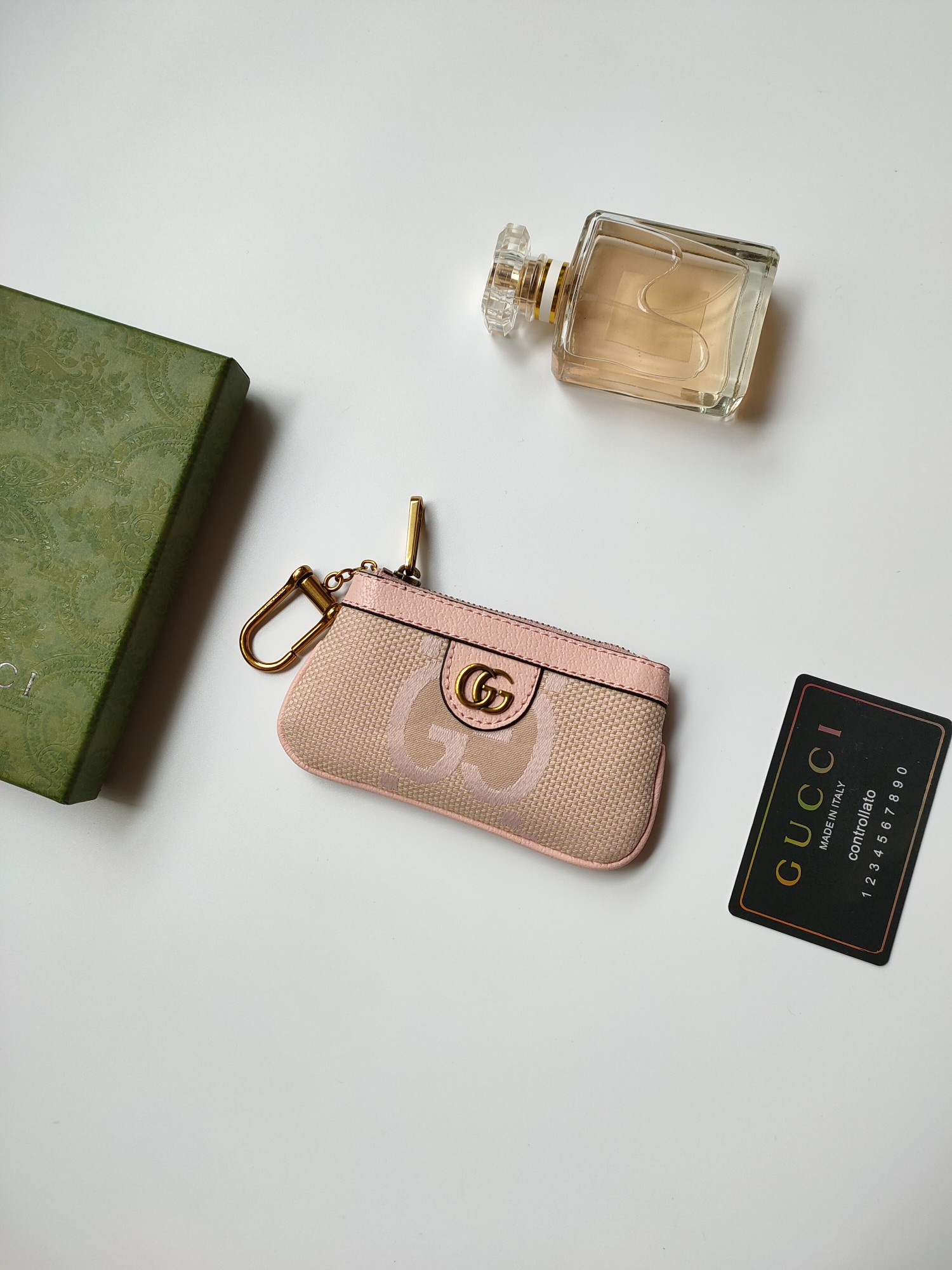 Gucci 小財布 - 大字布料と古銅双G金具の洗練されたデザイン