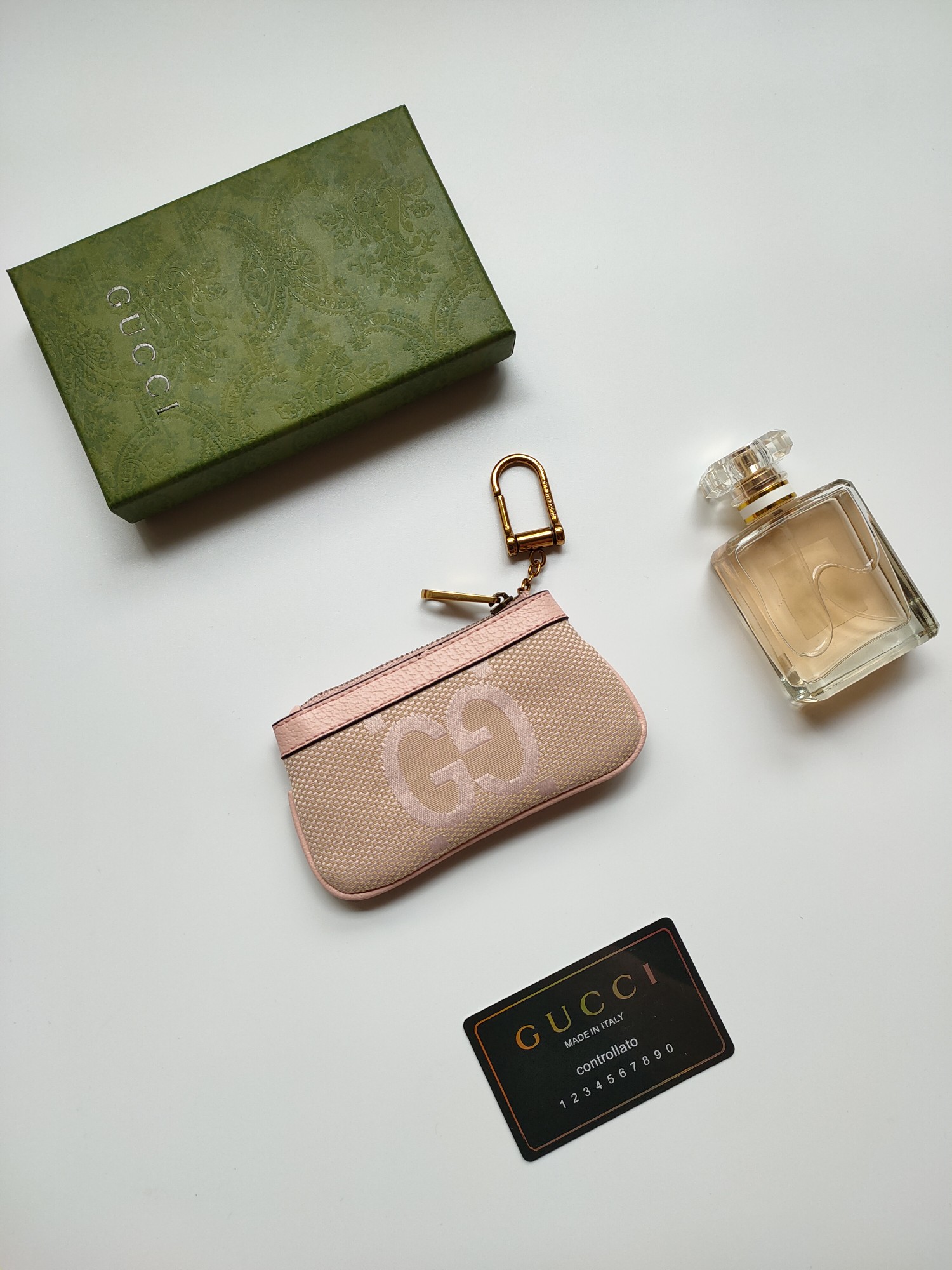 Gucci 小財布 - 大字布料と古銅双G金具の洗練されたデザイン