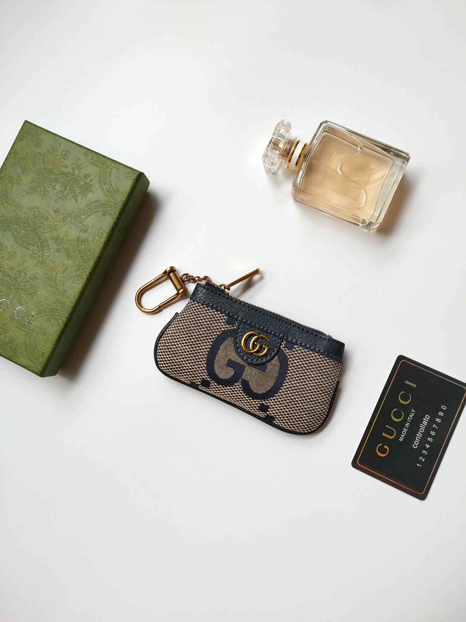 Gucci小銭入れ - 大字布料と古銅双G金具の洗練されたデザイン