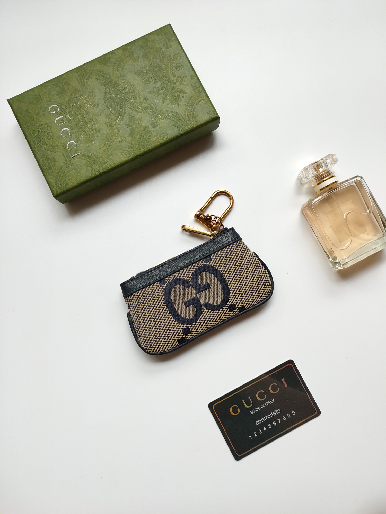 Gucci小銭入れ - 大字布料と古銅双G金具の洗練されたデザイン