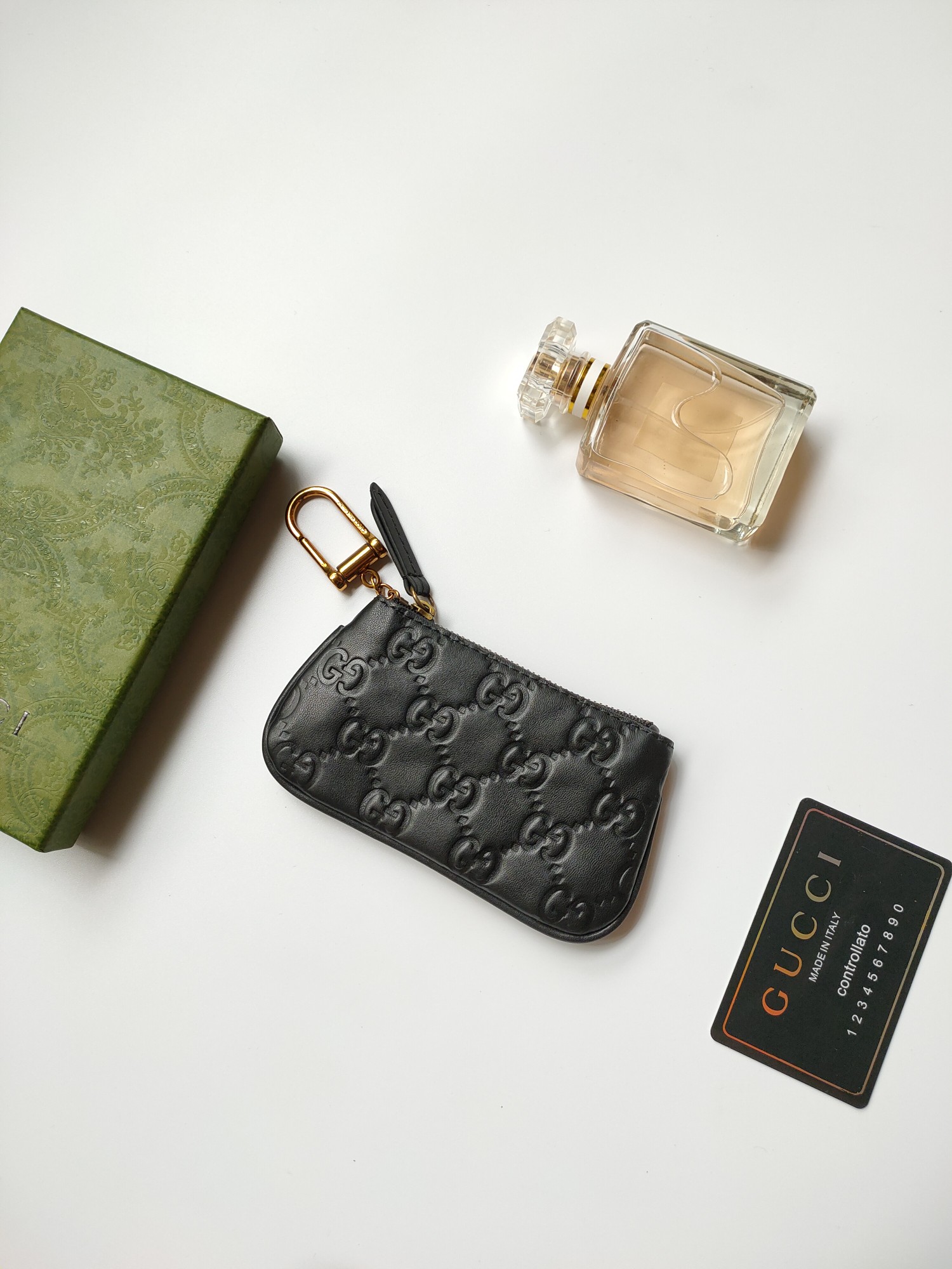 小牛皮製のコンパクトな小銭入れ - 古銅色のダブルG金具付き