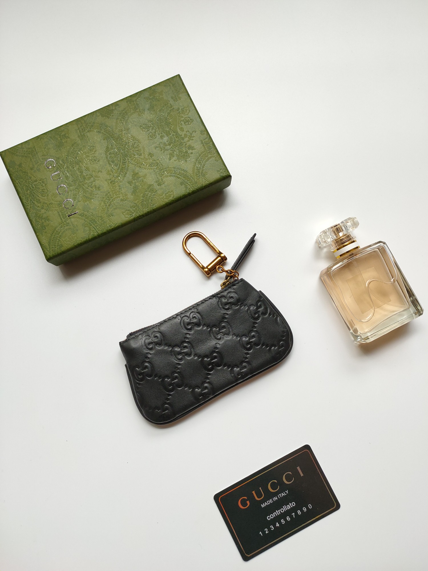 小牛皮製のコンパクトな小銭入れ - 古銅色のダブルG金具付き