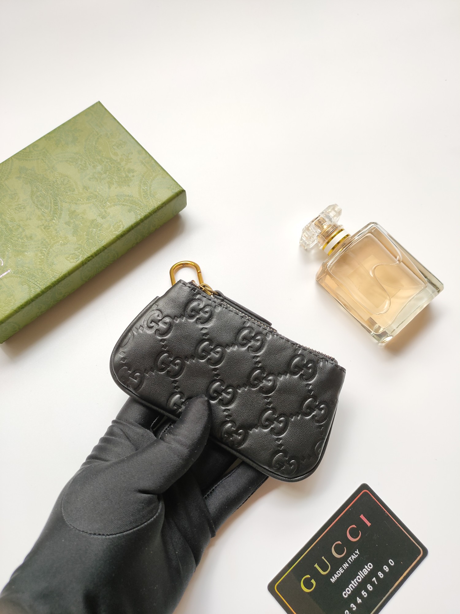 小牛皮製のコンパクトな小銭入れ - 古銅色のダブルG金具付き