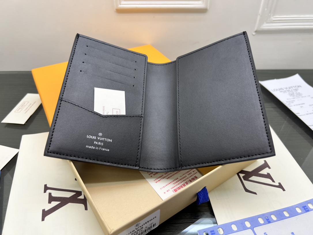 The leather passport holder in its packaging