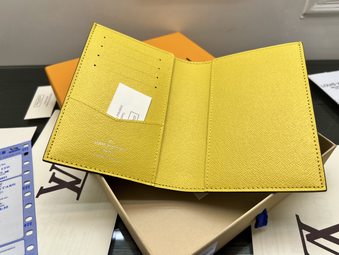 Passport cover held in hand