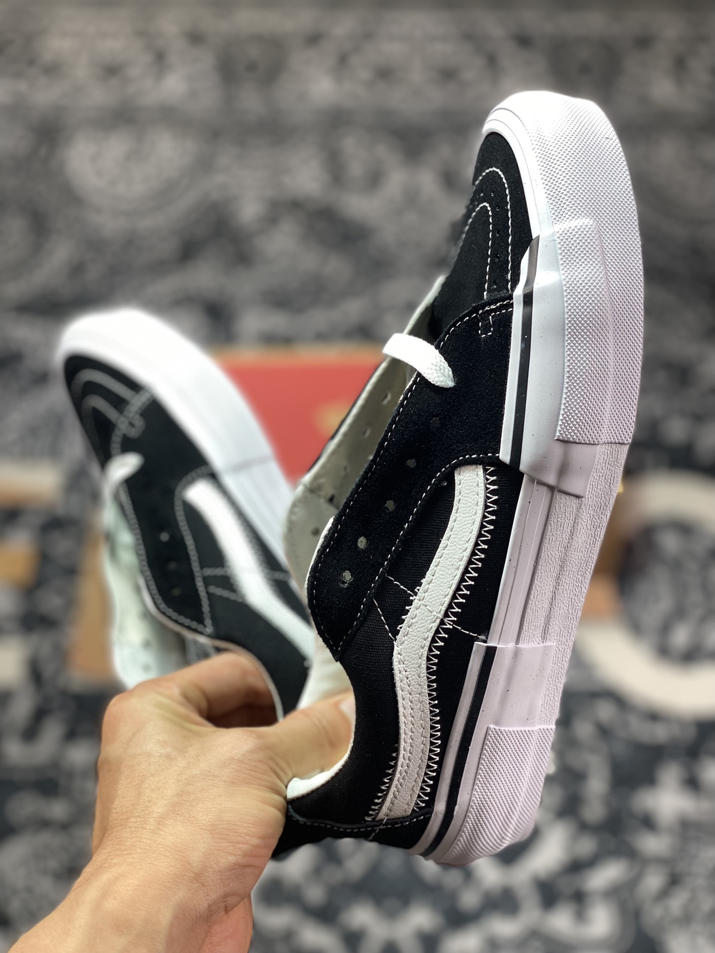 Vans Sk8-Low deconstructed black and white with black and white stripes classic shoe shape