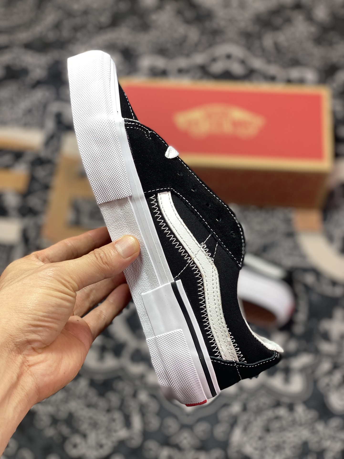 Vans Sk8-Low deconstructed black and white with black and white stripes classic shoe shape