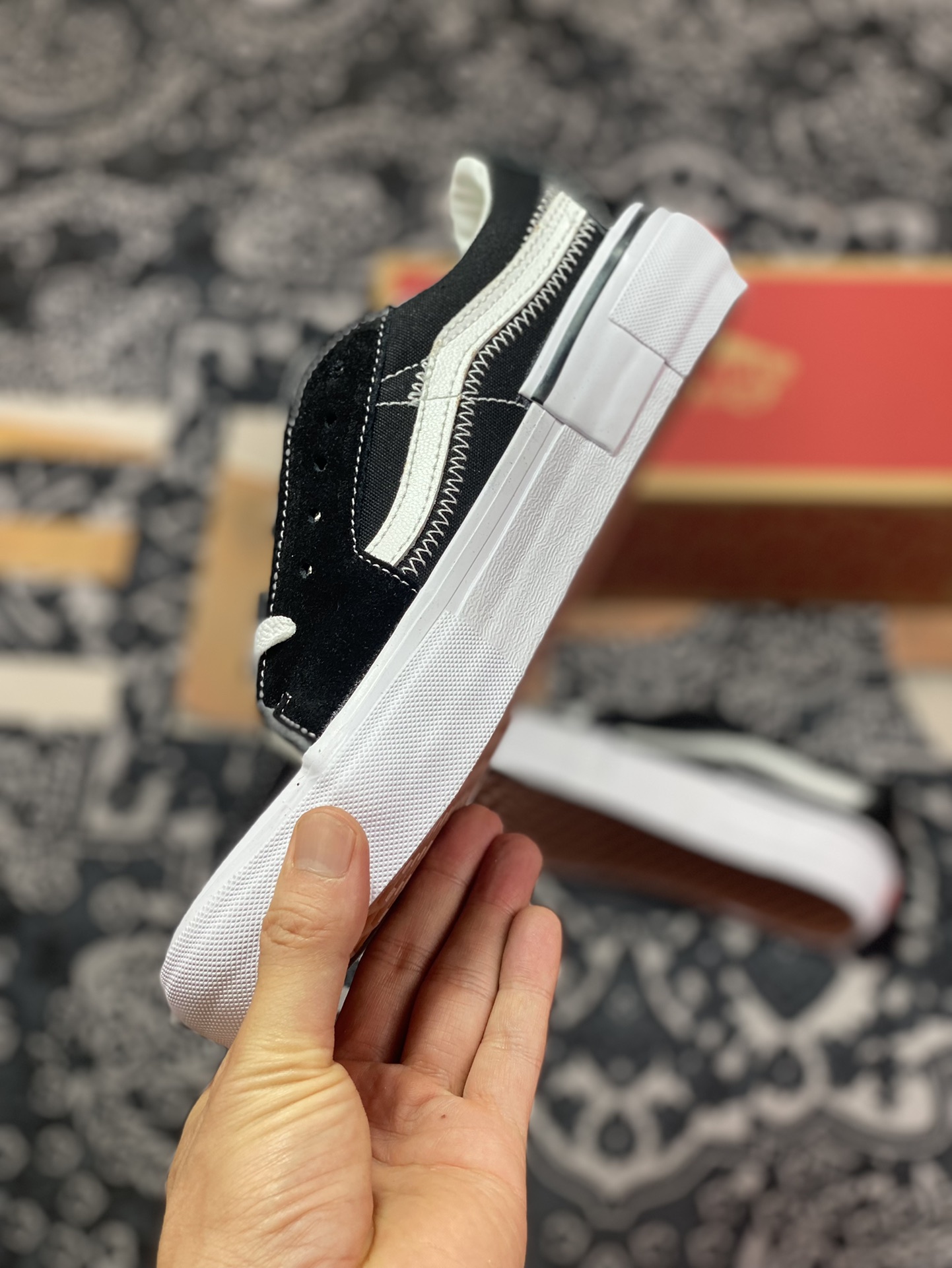 Vans Sk8-Low deconstructed black and white with black and white stripes classic shoe shape