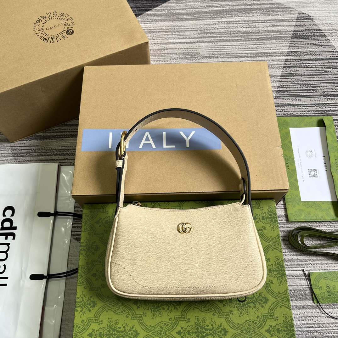 GUCCI crescent-shaped small shoulder bag soft leather double G logo