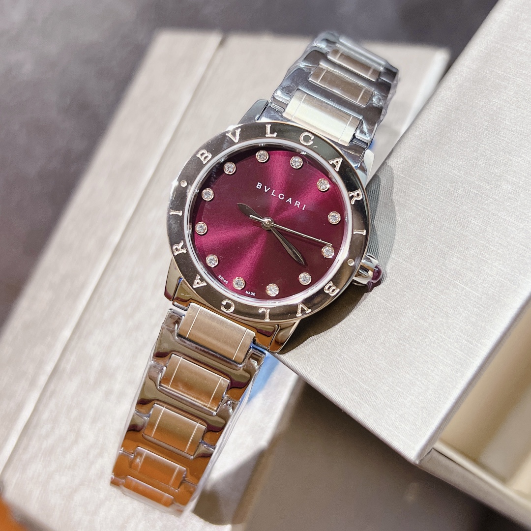 Bvlgari Bvlgari Bvlgari 33mm rose gold-tone case, brown bezel, burgundy dial, silver-tone bracelet 33mm Women's Quartz