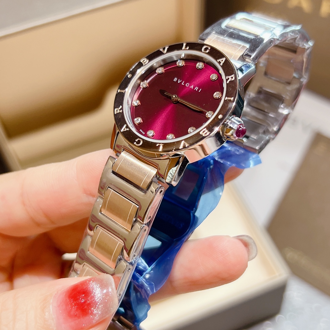 Bvlgari Bvlgari Bvlgari 33mm rose gold-tone case, brown bezel, burgundy dial, silver-tone bracelet 33mm Women's Quartz