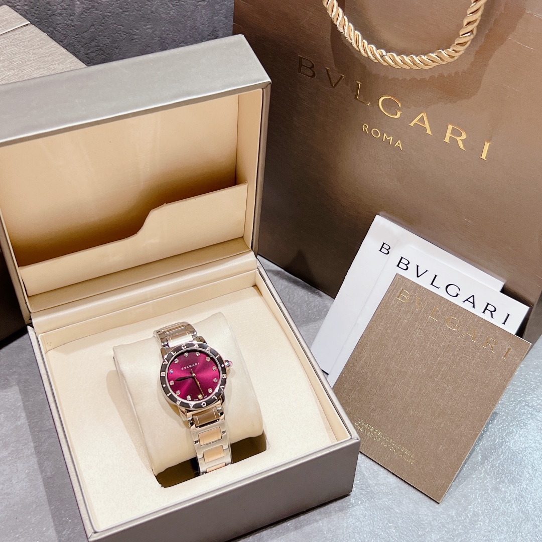 Bvlgari Bvlgari Bvlgari 33mm rose gold-tone case, brown bezel, burgundy dial, silver-tone bracelet 33mm Women's Quartz