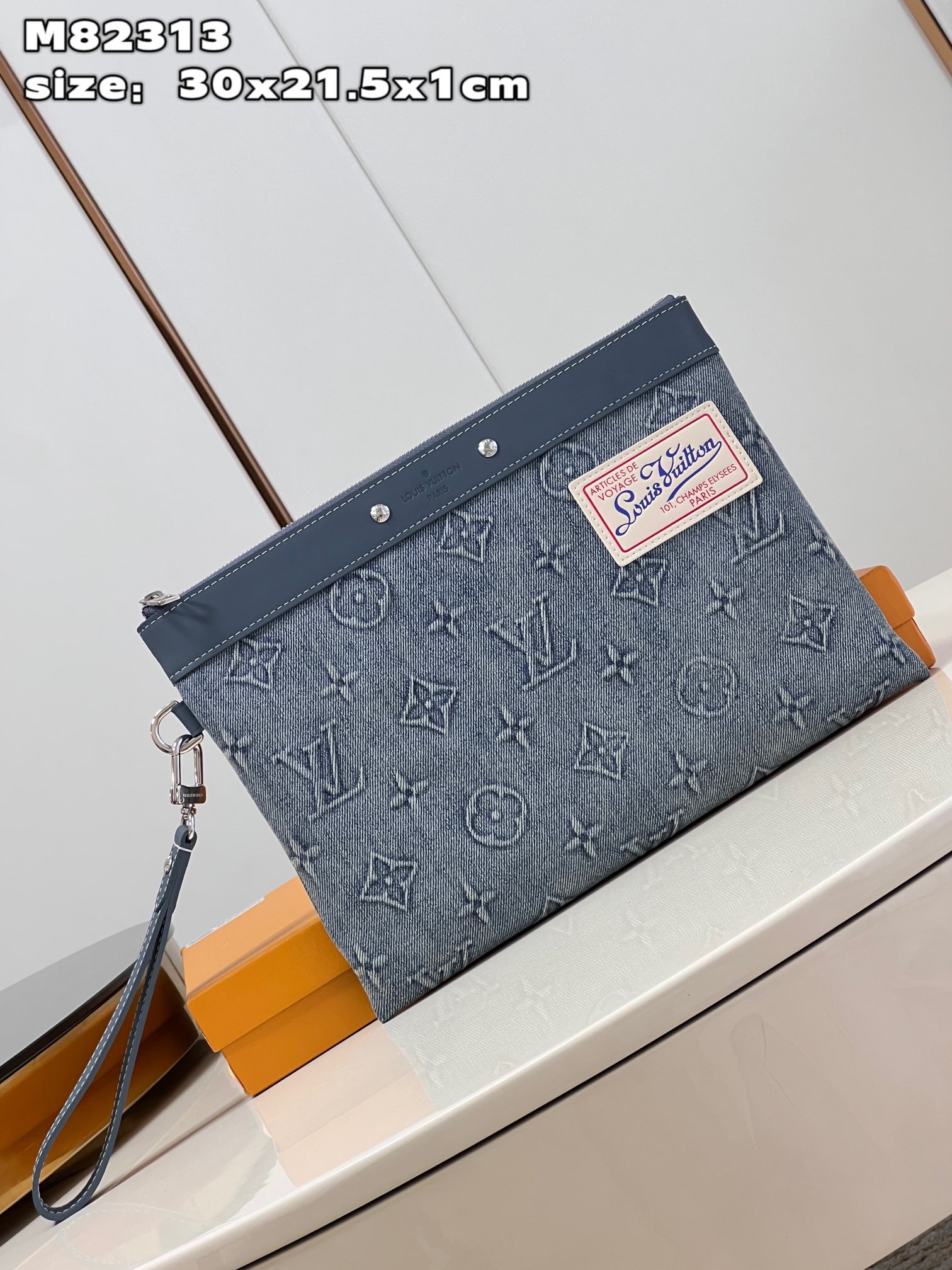 This Pochette To-Go pouch is crafted from Monogram Washed Denim canvas - Bag 2