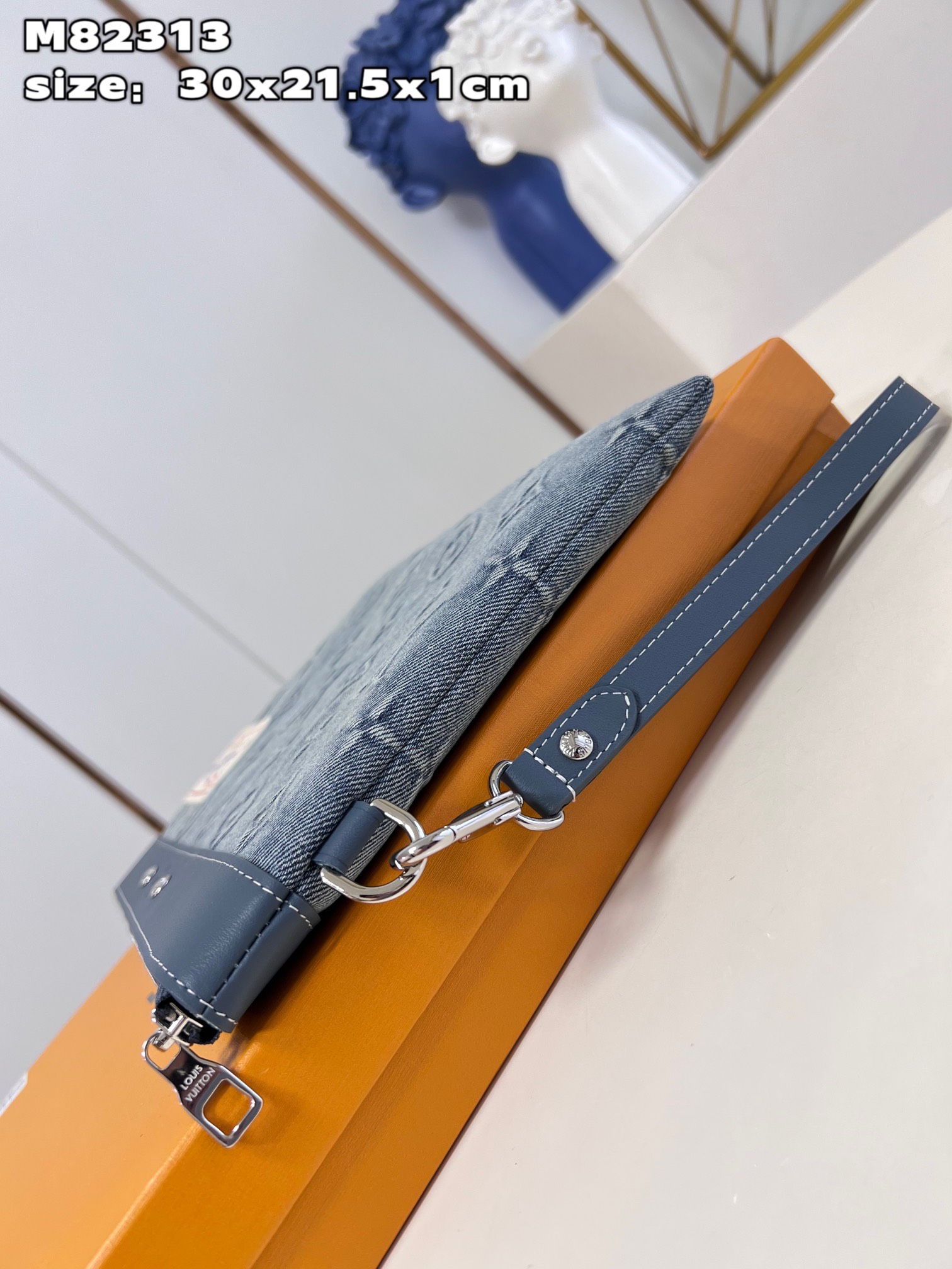 This Pochette To-Go pouch is crafted from Monogram Washed Denim canvas - Bag 6