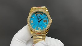 What
 Rolex Watch Blue Gold Yellow Day-Date
