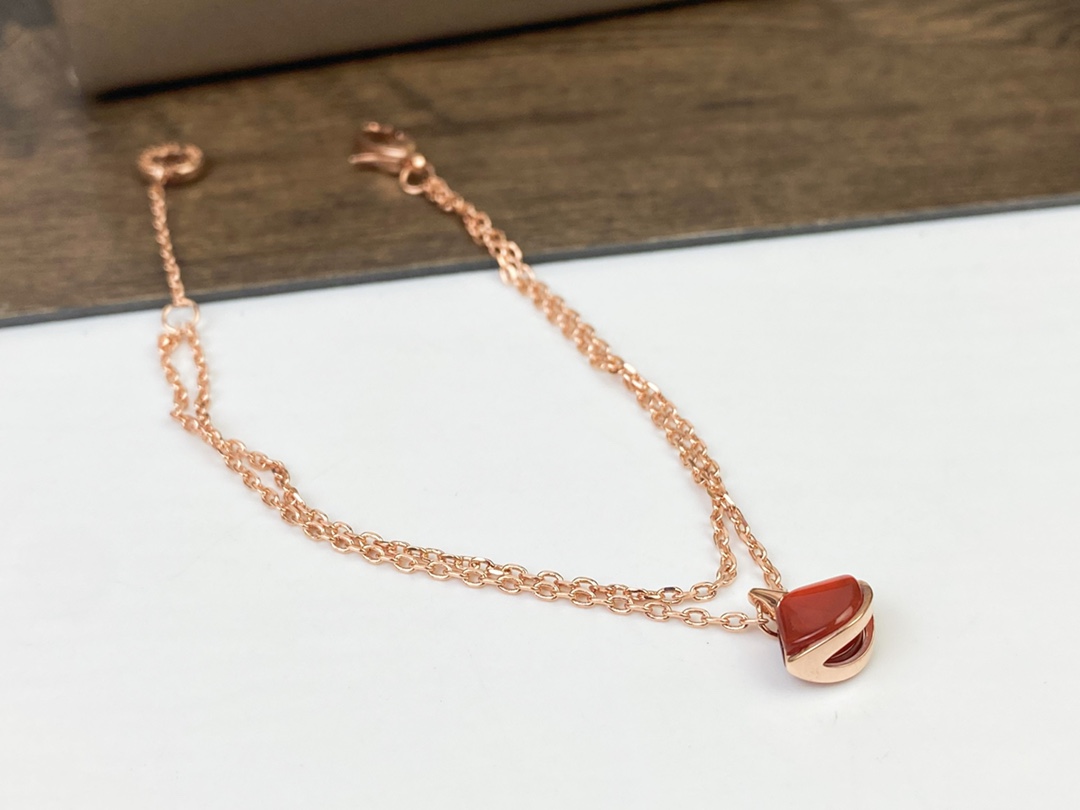 Luxury BVLGARI Dress Line: High-End 18k Gold Peacock Rock Bracelet and Custom Jewelry Collection - 图片 4