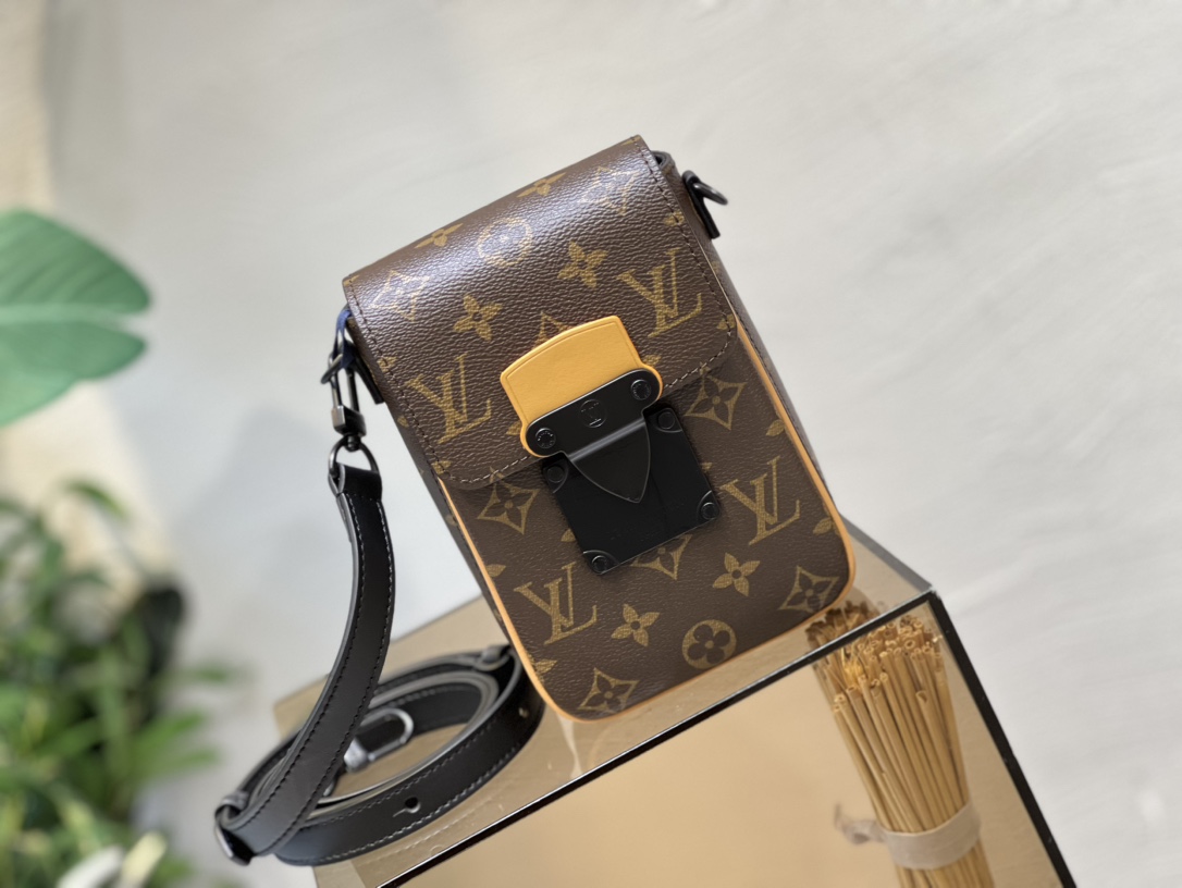 Crafted from Louis Vuitton's iconic Monogram Macassar canvas, the S-Lock - Bag 2