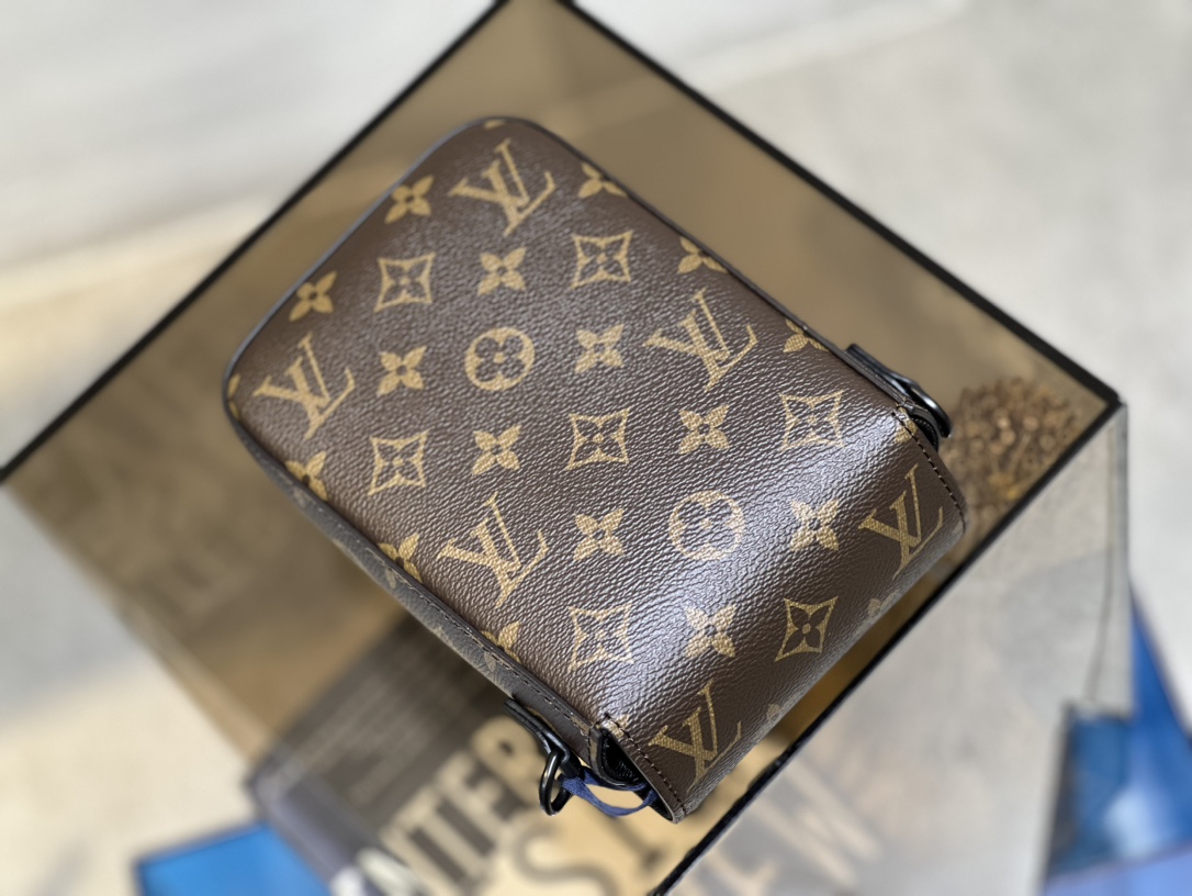 Crafted from Louis Vuitton's iconic Monogram Macassar canvas, the S-Lock - Bag 5