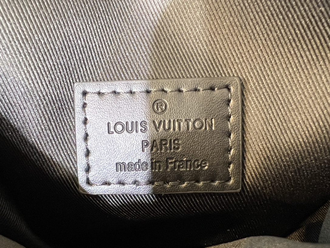 Crafted from Louis Vuitton's iconic Monogram Macassar canvas, the S-Lock - Bag 9