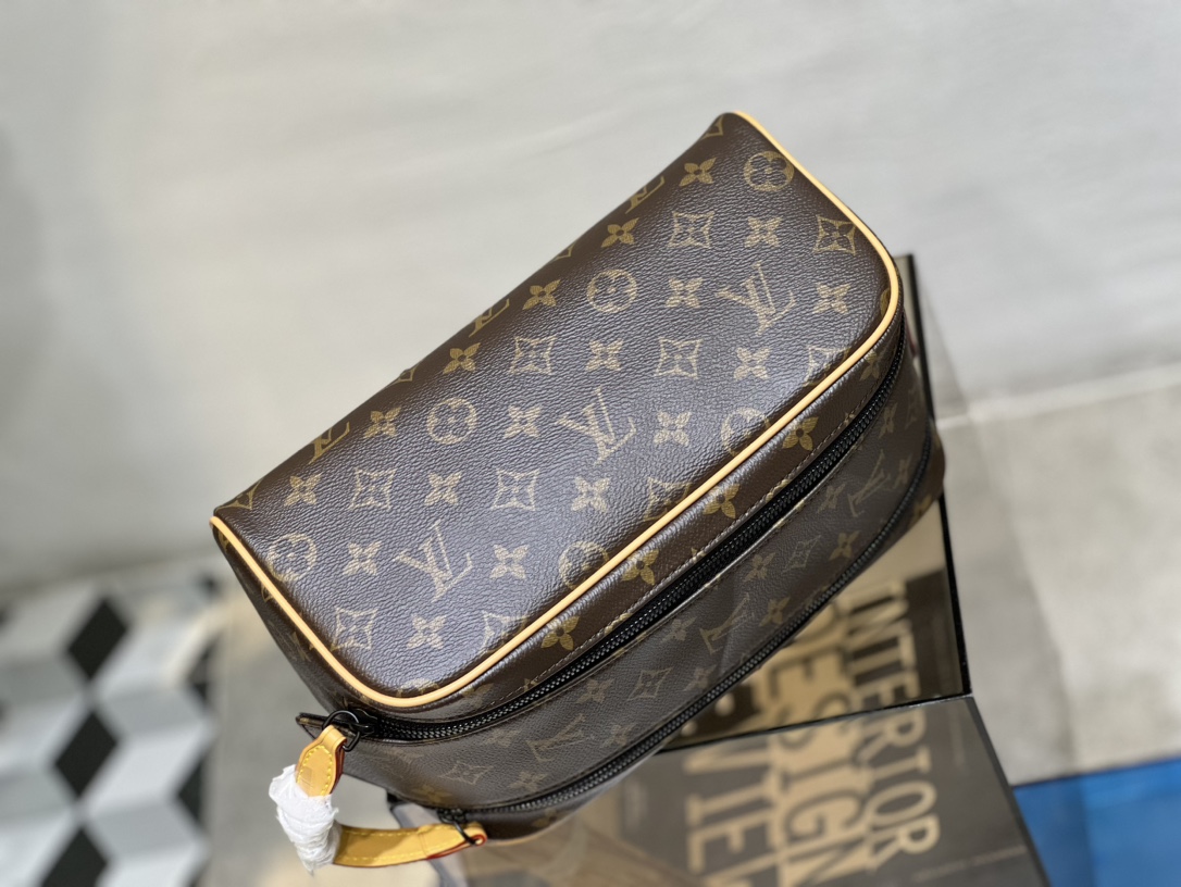 This Dopp Kit toiletry bag is crafted from Monogram Macassar coated - Bag 5