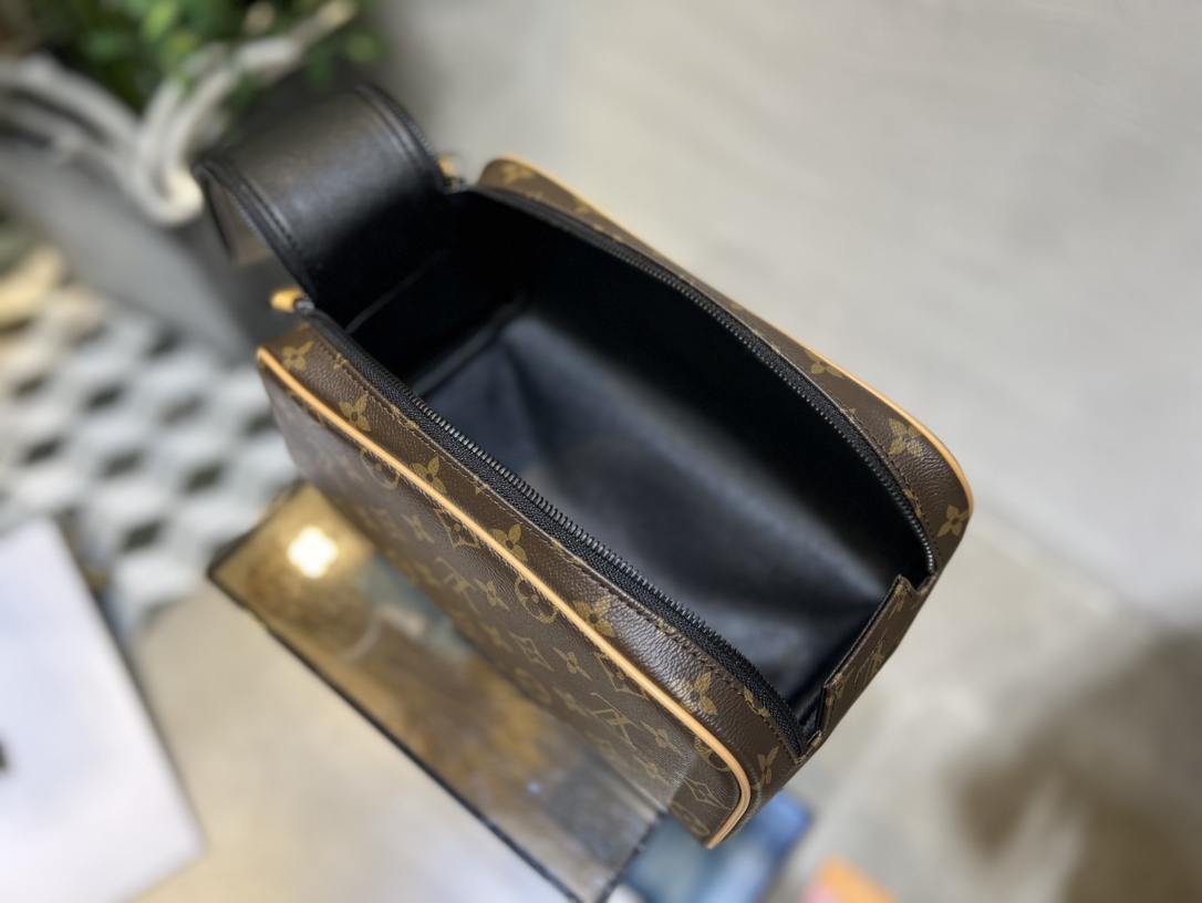 This Dopp Kit toiletry bag is crafted from Monogram Macassar coated - Bag 8