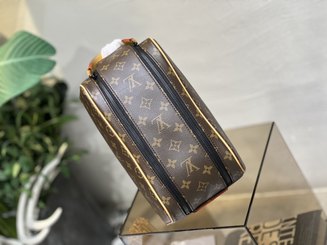 This Dopp Kit toiletry bag is crafted from Monogram Macassar coated - Bag 2