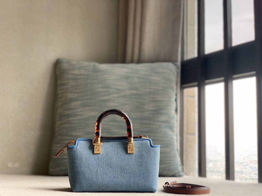 Fend1 Iconic By The Way Boston mini bag in light blue denim, made of light blue denim, decorated with FENDI ROMA embroidery in the same color and