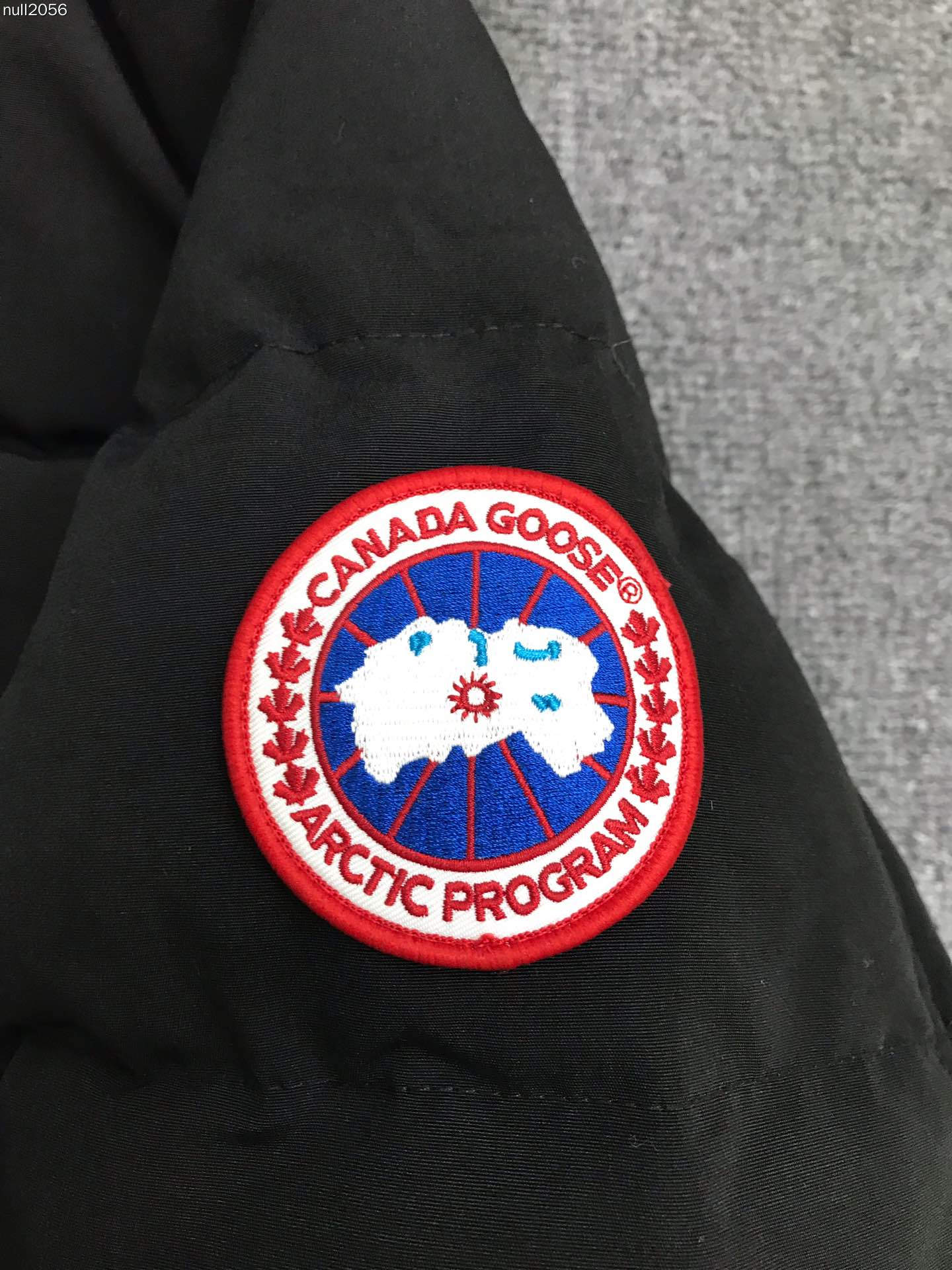 Guangzhou top version Carson down jacket with fur hood, black with red label, sizes S-XXL.-Big cat