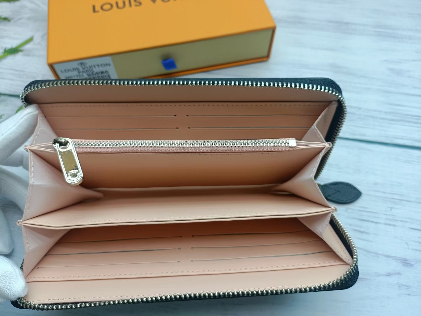 Wallet held in a hand