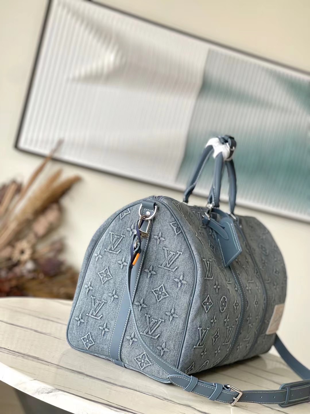 This Keepall Bandoulière 50 travel bag reinvents one of Louis Vuitton’s - Bag 2