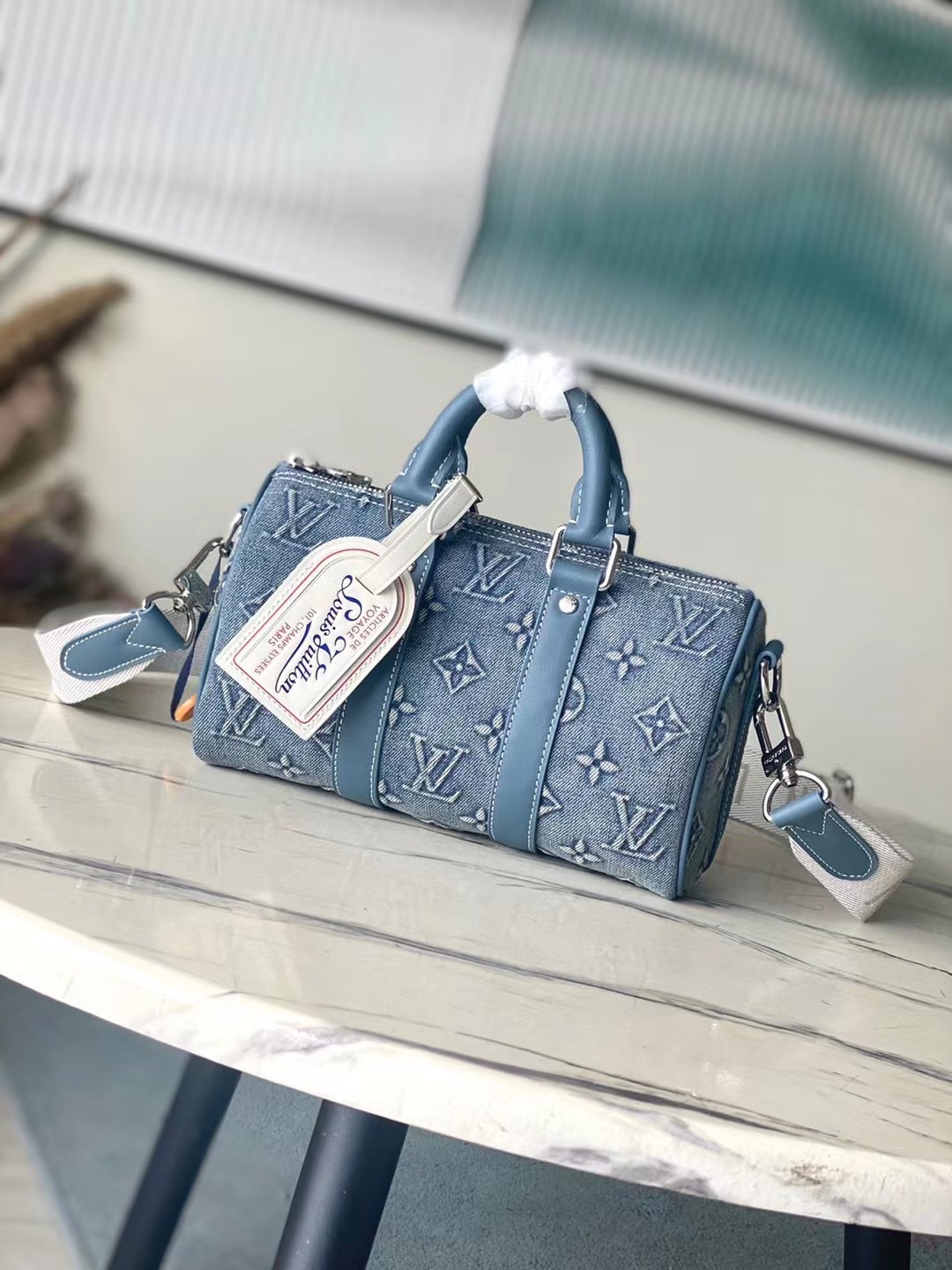 The Keepall Bandoulière 25 bag showcases the vintage appeal of Monogram - Bag