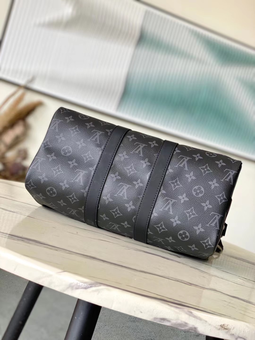 海外顶级原单 M46655 黑花 Keepall Bandoulière 35 手袋是经典 Keepall 假日旅行袋的缩微版本 4