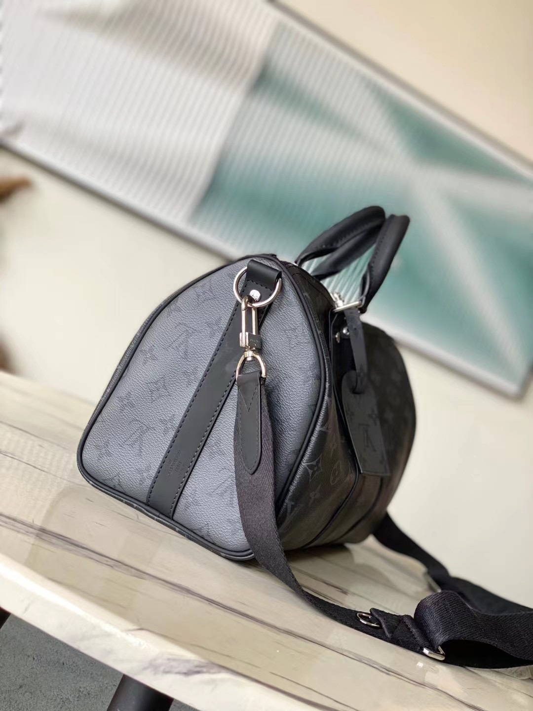 海外顶级原单 M46655 黑花 Keepall Bandoulière 35 手袋是经典 Keepall 假日旅行袋的缩微版本 2