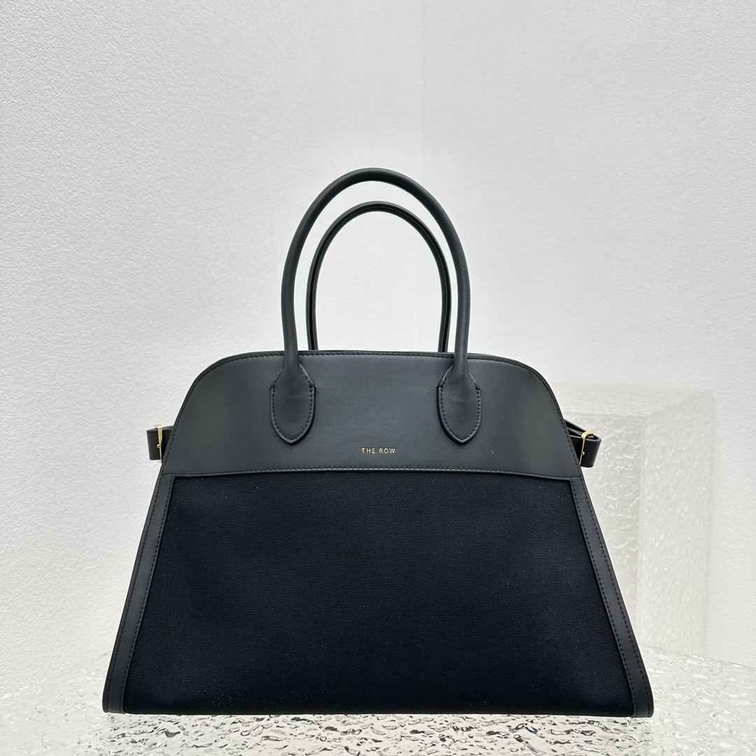 中号帆布皮拼接黑Margaux15系列帆布皮拼接品牌在极简设计上的功力线条干净尽管没有什么logo印花的