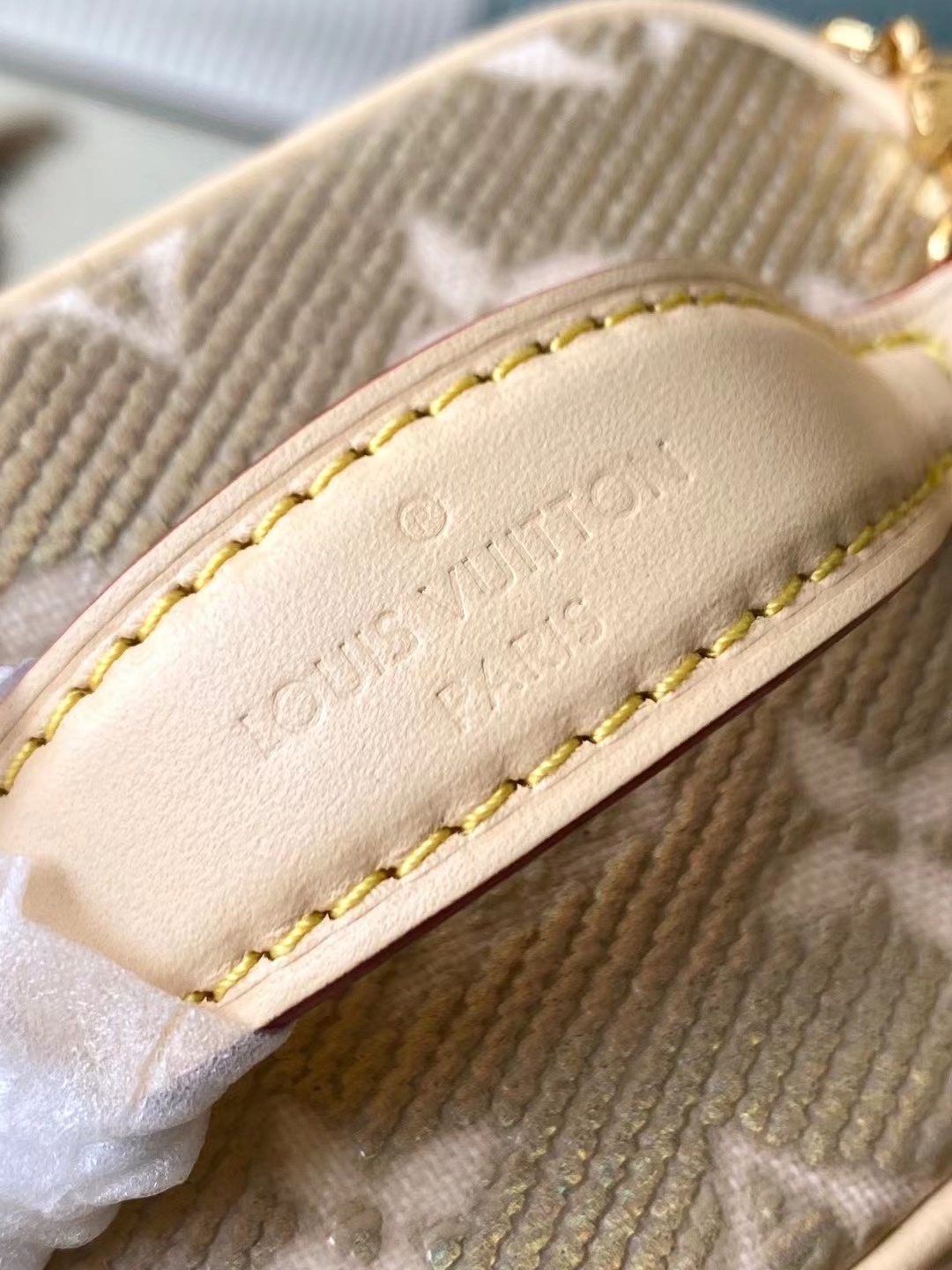 this Micro Vanity handbag features a special coating that envelops its - Bag 7