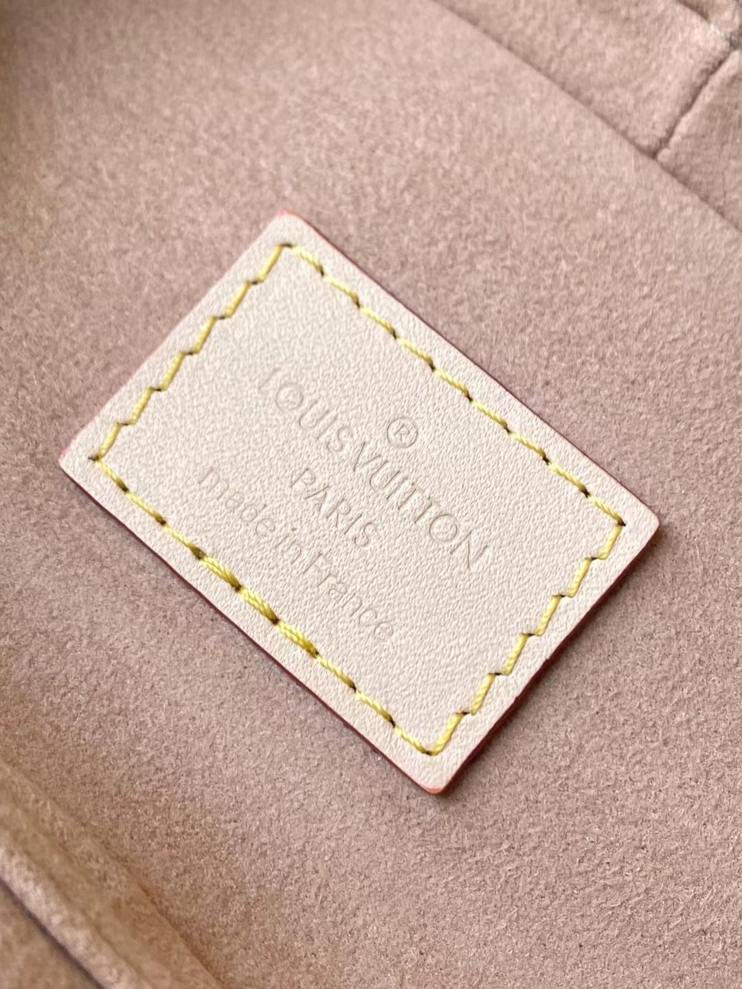 this Micro Vanity handbag features a special coating that envelops its - Bag 8