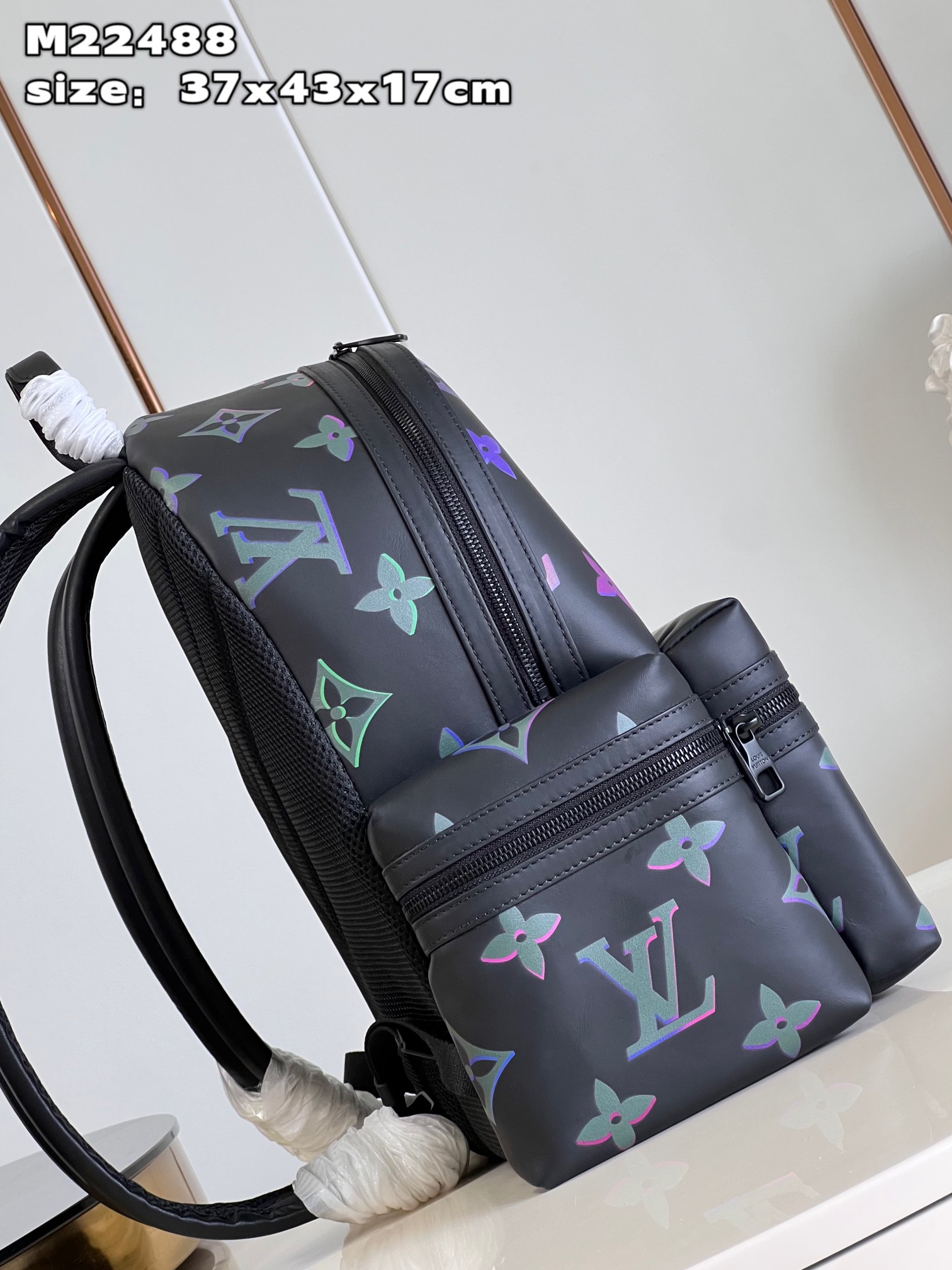 the Comet Backpack features the Monogram motif with vibrant neon-colored - Bag 5