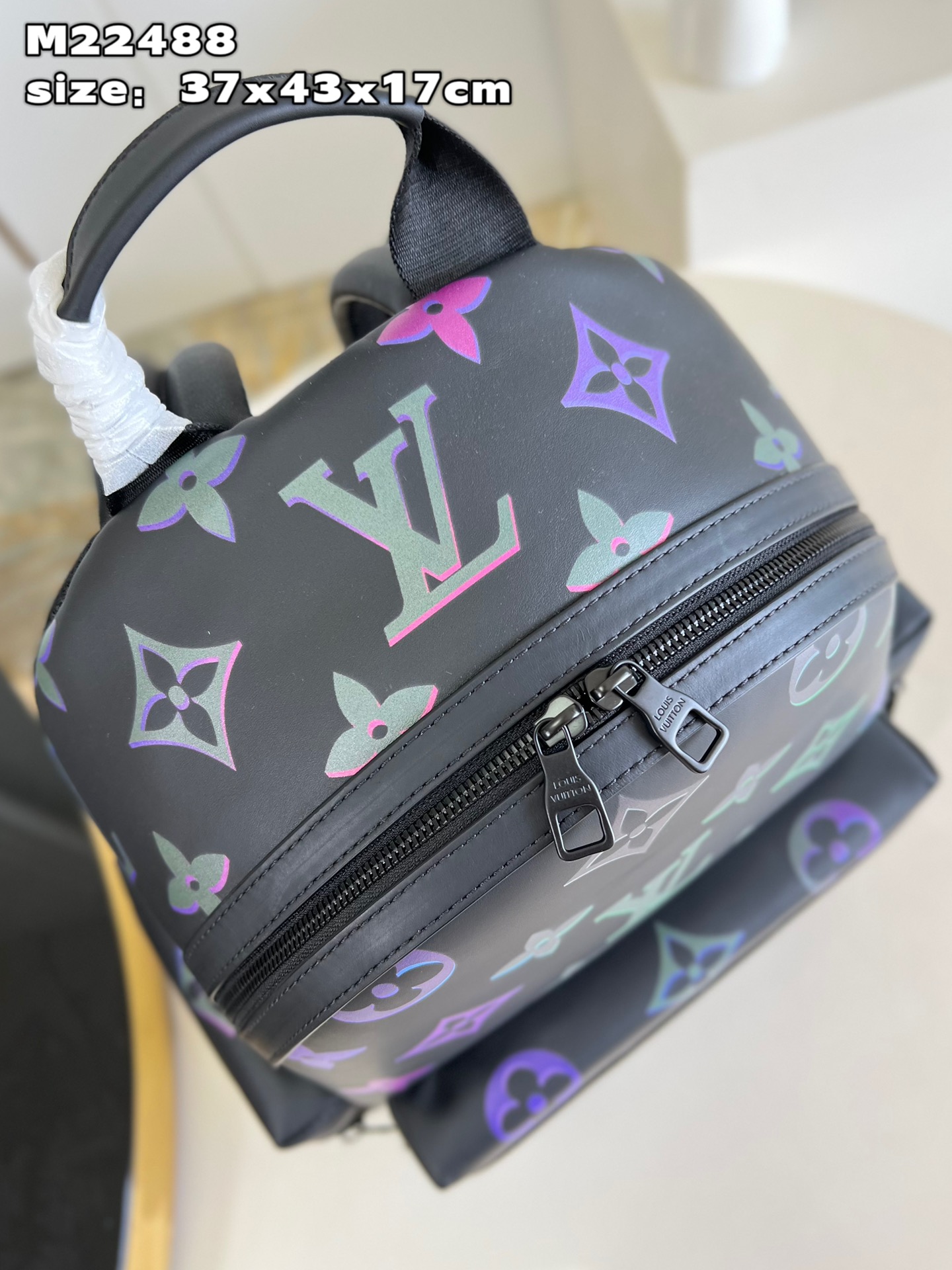 the Comet Backpack features the Monogram motif with vibrant neon-colored - Bag 7