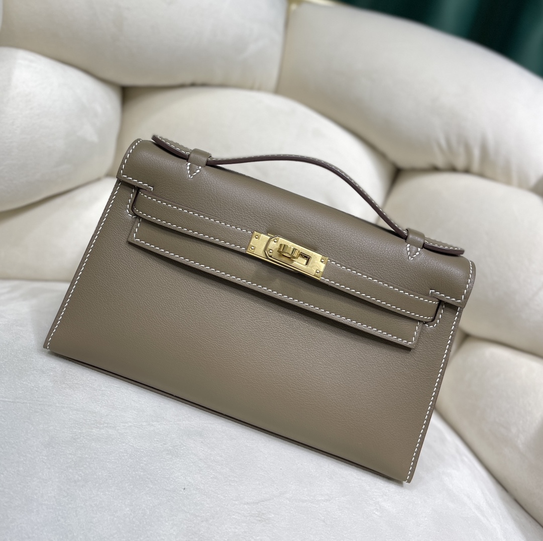 Hermès Kelly Generation Elephant Gray, all Swift cowhide inside and out, all steel hardware, truly semi-handmade! It feels soft and elastic, and