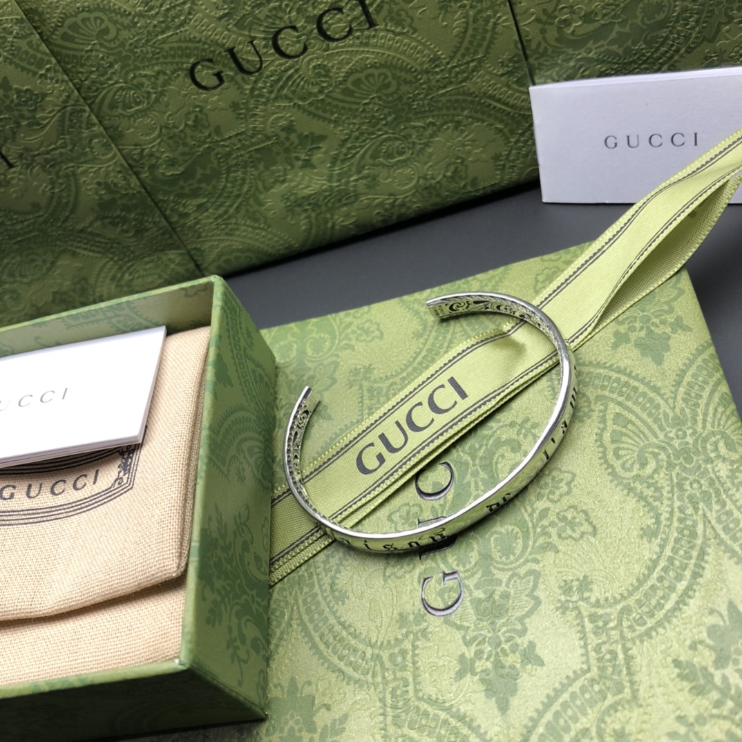 Gucci Silver-Tone Bracelet with Engraved Details | Adjustable Cuff