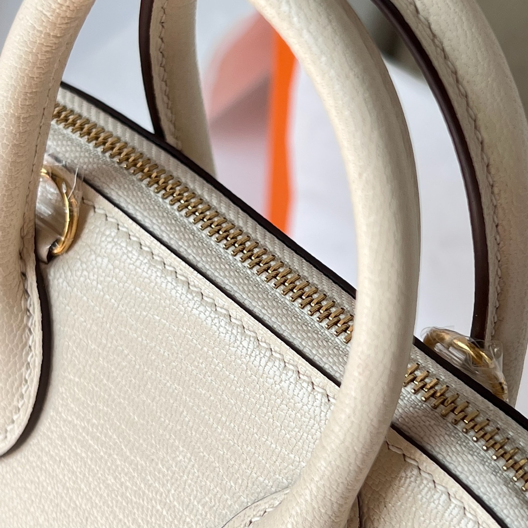 Hermès Hermes entry-level Mini bolide 20cm chevre imported goatskin I2 cream white top craftsmanship fully stitched with wax thread gold buckle