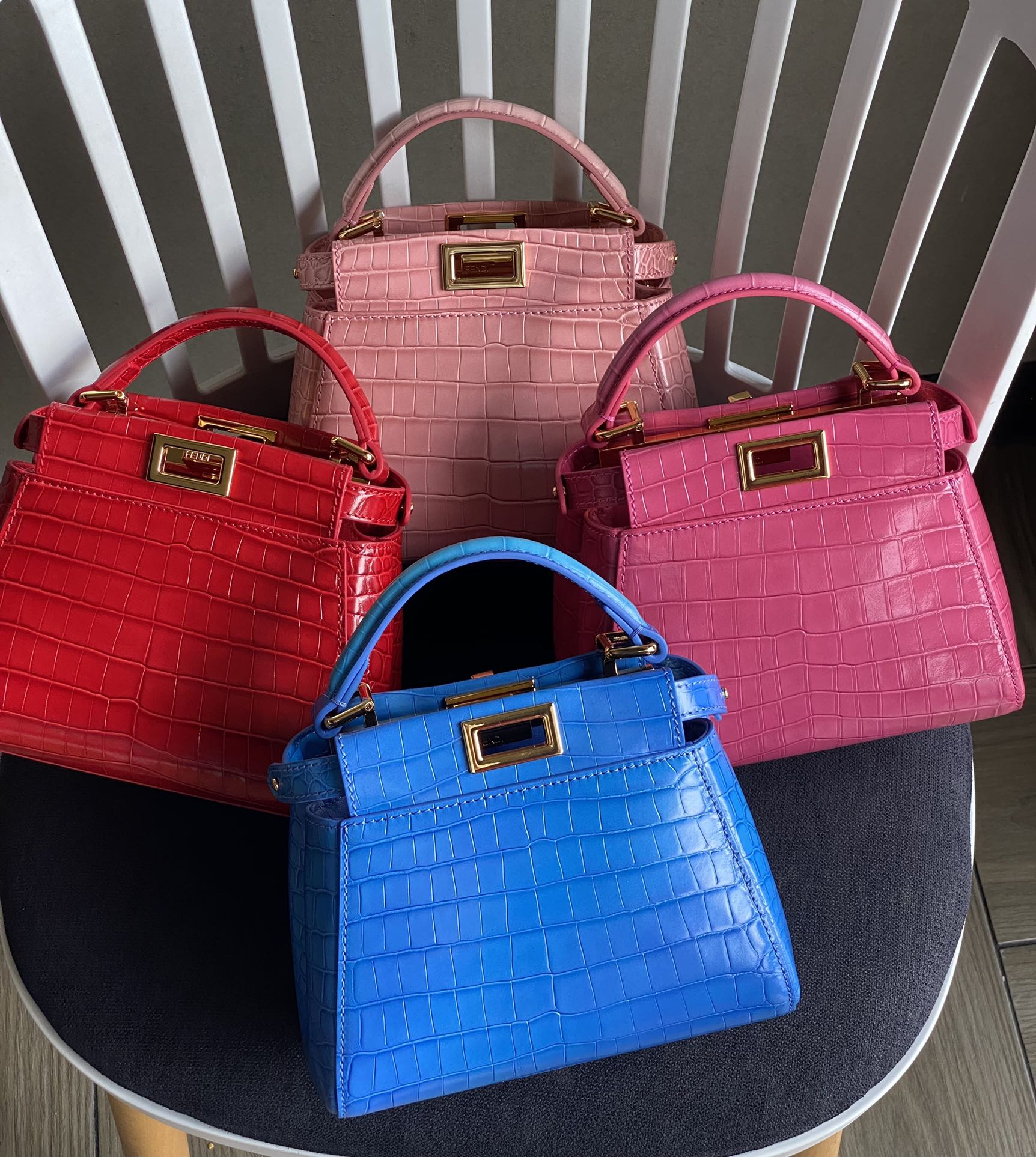 Fendi 980 Fs new peekaboo series small handbag, with internal pockets and iconic twist lock. Single handle and detachable shoulder strap. Made of
