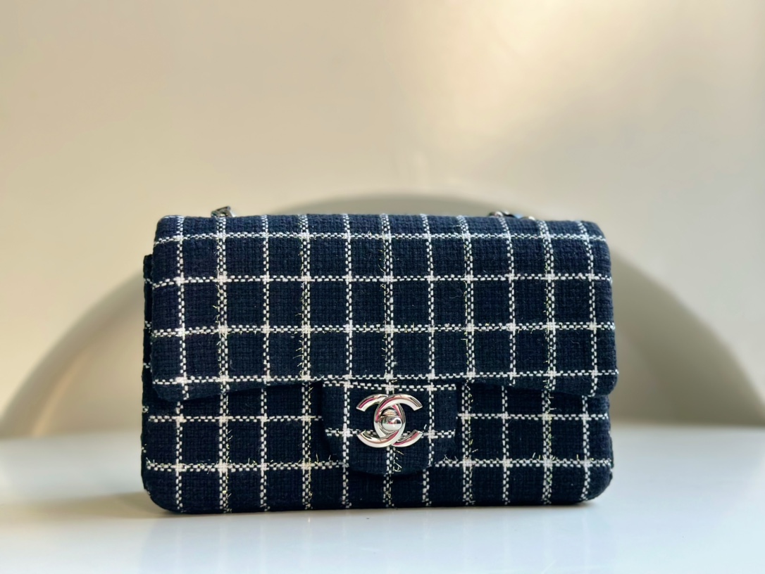 CHANEL 23P handmade plaid bag with CF lambskin lining. Limited edition. Very popular with celebrities and bloggers. Can be worn on one shoulder a