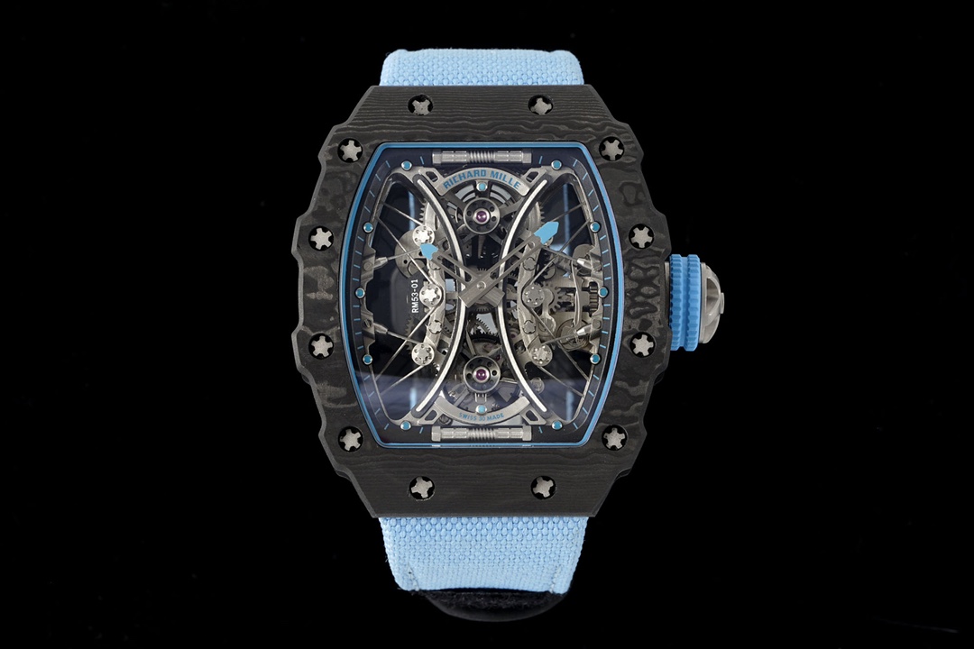 NO:946330,[RICHARD MILLE] Richard Mille RM53-01 combines watch design with sports events. With the background of equestrian sports, it is made of a variety of high-tech materials and acts like a 'protective gear' to resist strong impacts during exercise. The 'RM 53-01 ABLO MAC DONOUGH' tourbillon watch can be called one of the most 'resistant' luxury sports watches in the world. 1. The case continues the classic barrel shape design, which is highly recognizable. The diameter of the watch is approximately 51x43x16mm. The case is made of TT carbon fiber composite material, which is famous for its excellent shock resistance. The carbon fiber material ensures the hardness of the watch, is light and shockproof, highlights the sporty style, and has a unique texture, adding unique ornamental value to the watch. The case is fixed with 20 grade 5 titanium alloy spline screws and 316L stainless steel washers, which ensures 50 meters of waterproof performance. 3. The watch mirror of this watch is also very strong. It uses a patented UV-resistant UV-coated laminated sapphire crystal watch mirror. The watch mirror will not break into pieces when it is violently impacted, only cracks will appear. Even if the watch mirror is faced with a strong impact, it will not break and splash, which greatly avoids damage to the movement and the wearer. 3. The upper hollow disk is made of titanium alloy. There are blue fluorescent marks on the surrounding time scales, which contrast with the blue fluorescent marks on the hour and minute hands in the middle. It is very convenient to observe the time even in a dark environment. 4. The back of the watch shows the entire fishing system to the public at a glance. The bridge plate has a double bottom plate structure that breaks the convention. It consists of the first 'central' bottom plate that firmly fixes different movement gears together, and is attached to the central bottom plate through a steel cable to support the entire tension. The 'outer edge' bottom plate of the system consists of a suspended steel cable movement divided into two parts. The outer part is the steel cable and the pulley, and the inner part is the 'suspended' tourbillon movement. It strengthens the rigidity of the watch, while ensuring the smooth operation of the gear system and providing the best impact protection. This RM53-01 wonderfully combines the functions of the two models RM27-01 and RM012 into one, showing a watch with a solid shell and an exquisite movement. Let us look forward to it together! ,19860909【RICHARD MILLE】里查德米尔RM53-01 将腕表设计与运动赛事相互结合.以马术运动为背景,采用多种高科技材料打造,如同“护具”来抵御运动时带来的强烈撞击. “RM 53-01 ABLO MAC DONOUGH”陀飞轮腕表堪称世界上最“抗造”的豪华运动腕表之一. 1表壳继续延续经典酒桶造型设计,辨识度高,表径约为51x43x16mm,采用TT 碳纤维复合材质制成表壳,以卓越的抗震性著称.碳纤维材料,保障了腕表的硬度,轻盈抗震,凸显运动风格,具有独特的纹理,为腕表增添独具特色的观赏性.表壳以20枚5级钛合金花键螺丝以及316L不锈钢垫圈固定,可保证50米的防水性能. 3此款腕表的表镜同样十分坚固,采用了具有专利的抗紫外线UV涂层层压式蓝宝石水晶表镜,让表镜在受到猛烈冲击时,不会变成碎块,只出现裂纹,即便直面迎来强烈撞击表镜也不会破碎飞溅,极大程度避免对机芯和佩戴者的伤害. 3上镂空盘由钛合金制成,周围的时标之上拥有蓝色荧光标记,与中部的时分针上的蓝色荧光标记相映衬,即使在较暗的环境下亦能够观察时间,非常便利. 4背透表底将整个垂钓系统一览无余地展现在大众面前,桥板有突破常规的双底板结构,由将不同机芯齿轮牢固地固定在一起的第一个“中央”底板,和通过钢索附着于中央底板,支撑整个张力系统的“外缘”底板构成,悬浮式钢索机芯分成两部分,外围是钢索和滑轮,内部是被“吊起来”的陀飞轮机芯.加强了腕表的刚度,同时确保齿轮系统流畅地运行,并可提供最佳的冲击保护. 这只RM53-01非常精彩地将RM27-01和RM012两只表款功能结合于一身,展现出一款坚固外壳、机芯精妙的腕表.就让我们共同期待吧！,,Watch