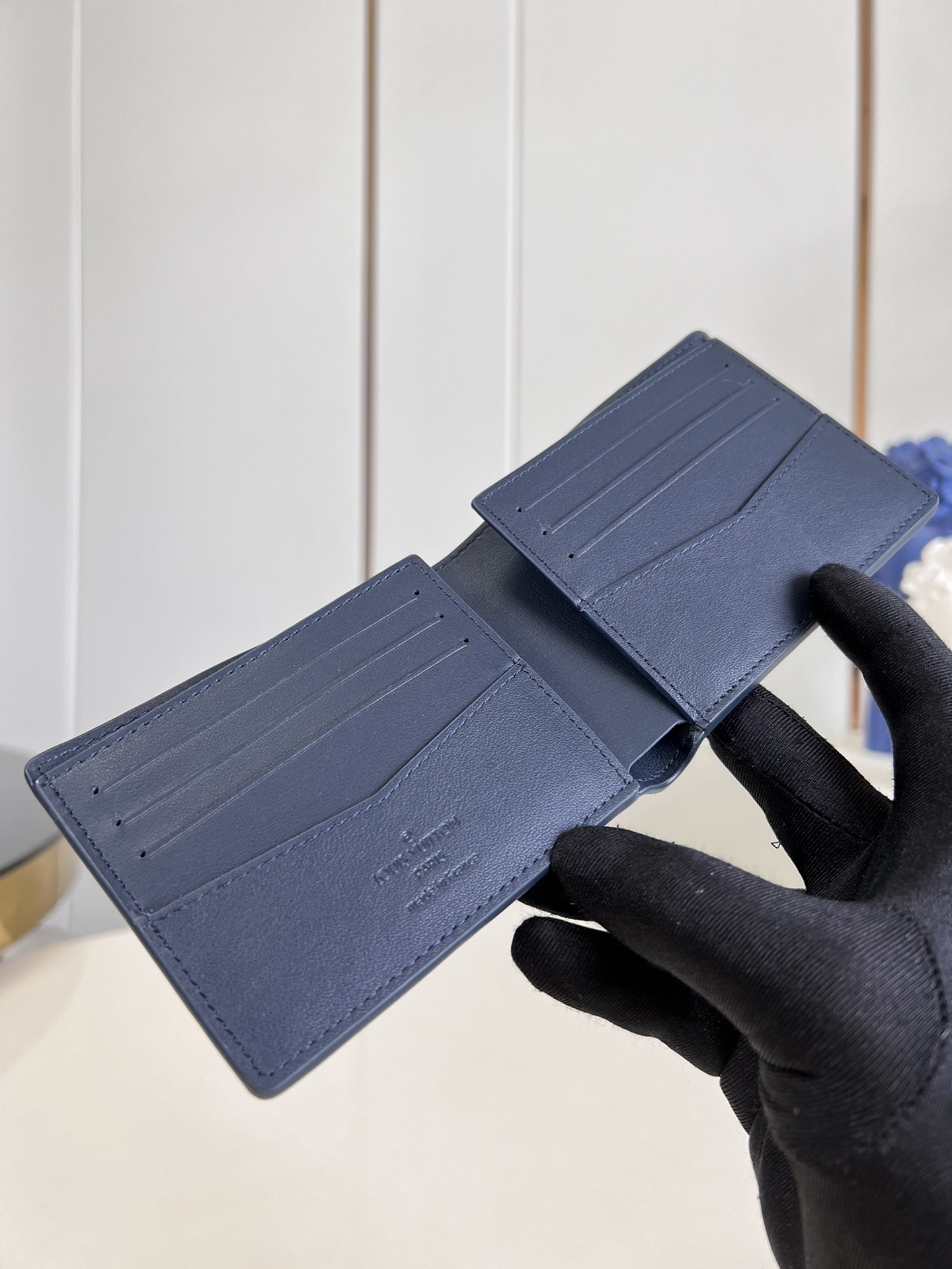 the Slender Wallet features a sleek silhouette that exudes timeless - Bag 4