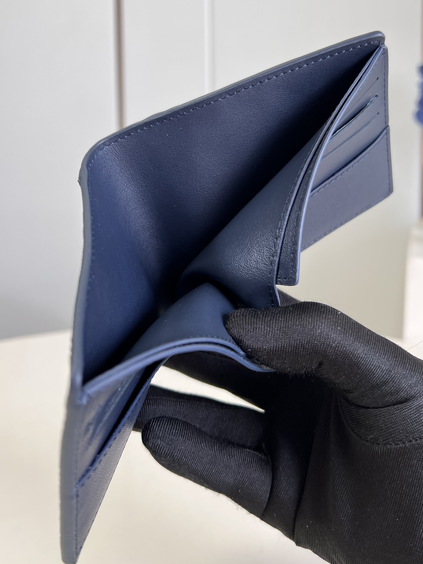the Slender Wallet features a sleek silhouette that exudes timeless - Bag 7