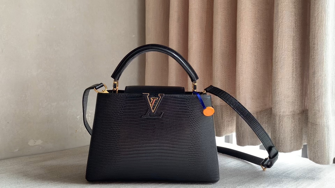 Louis Vuitton 99528 black lizard
