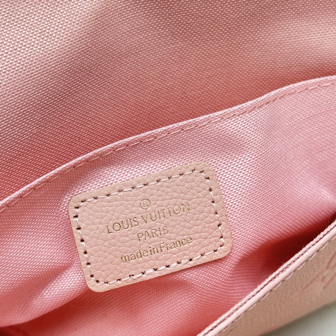 Leather wallet held as clutch